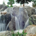 This 85-foot-wide, 15-foot-tall commercial entry waterfall is designed to be easily seen and recognized as a large waterfall from a distance, and its visual impact and “wow” factor grows as you get closer.