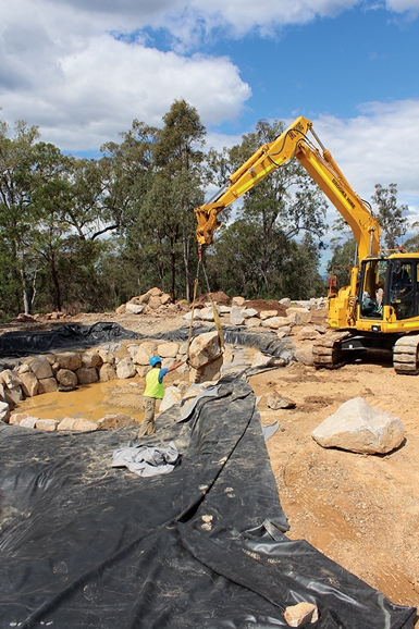 Placing a large boulder in a way that’s both structurally sound and organic in appearance is a thoroughly satisfying art. This one, in a recreational pond in Southeast Queensland, was no exception.