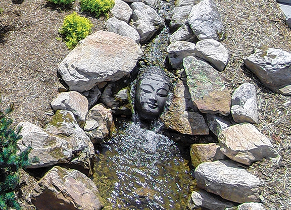 This was captured from 20 feet above the upper pond and shows the stream’s origin as well as the midstream Buddha head.