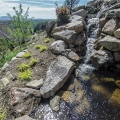 This shot was captured over the lower pond on this water feature. You can see the sheer face of the hillside along the left side of the photo. The drone was hovering six feet over the center of the pond.