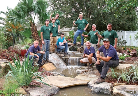 The team that toiled to create the backyard paradise: Aquascape Inc., Earth Works and Saundra Springer.