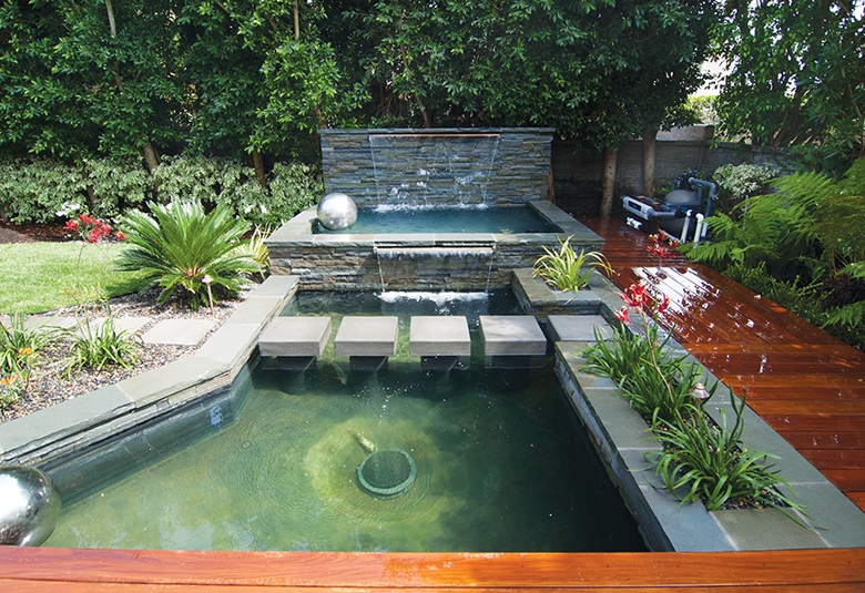 A formal koi pond can provide nutrients for the garden.