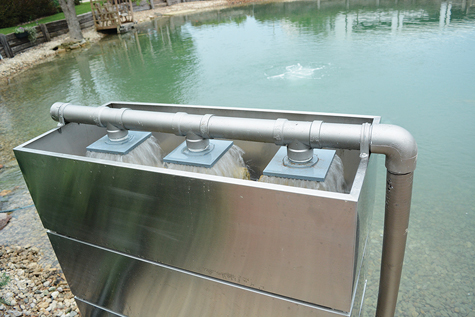 The conventional use of BHFM: a multi-tiered shower tower (Bakki Shower). All tiers are filled with media and water is sprayed evenly over the top. The water is clarified and degassed as it cascades through each level before returning to the koi pond.
