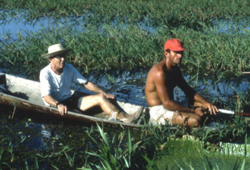 Pat Nutt with a guide on Amazon River hunting for giant Victoria waterlilies. (approx 1998)