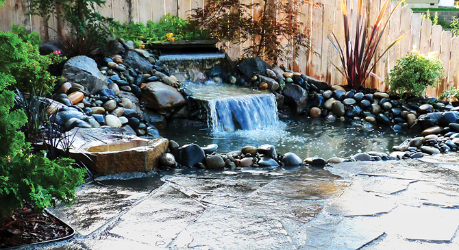 We built this water feature with a dry-laid flagstone patio surrounding the area.
