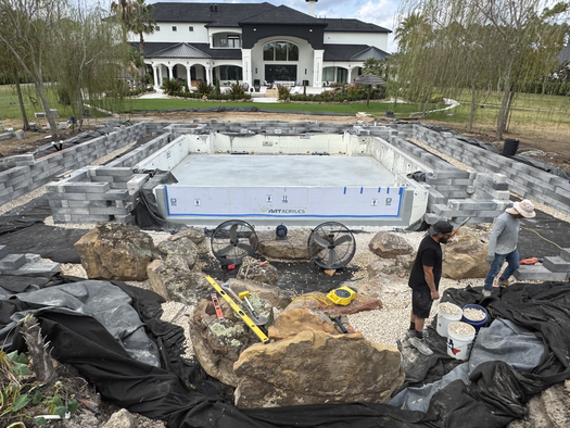 Acrylic viewing window in koi pond