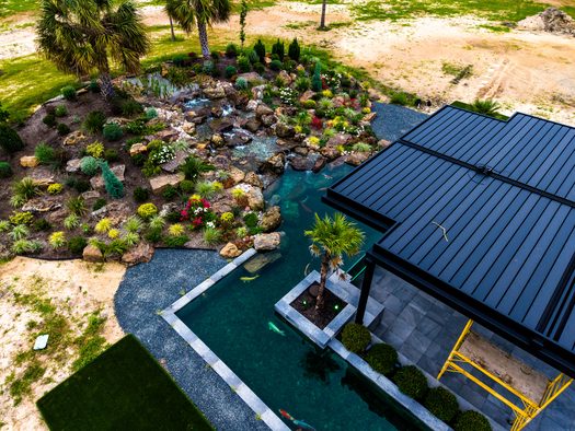 aerial view of waterfall immersive koi pond