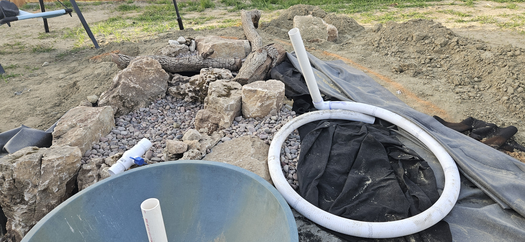 Spillway bowl under construction